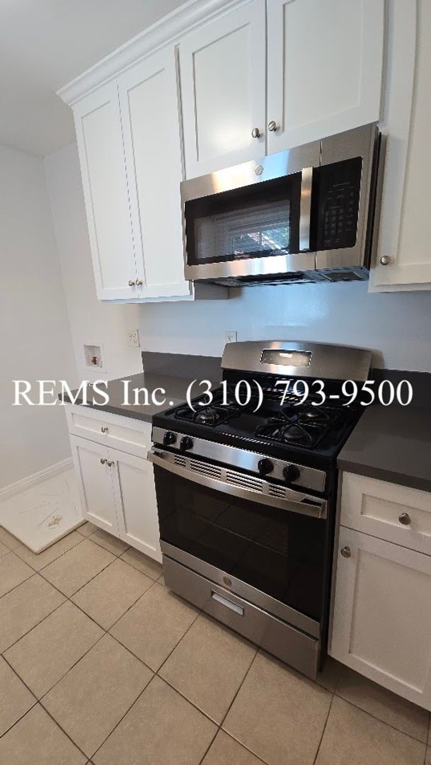 Photo - Remodeled 1 Bedroom Upstairs Apartment w/ Garage Parking Unit 9038
