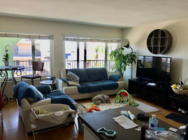 living room set up example - 306 4th St Apartments Unit 3