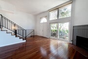 Gleaming hardwood floors & tall ceilings - 312 N Francisca Ave Townhome