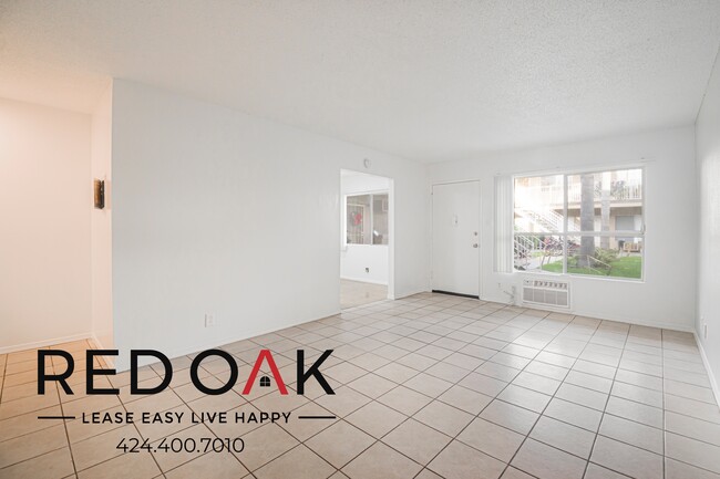 Building Photo - 9254 Palm St Unit 3