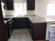 Photo - 14537 Archwood St Unit 302