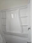 New tub/shower with shelving in tub - 6043 Romaine St