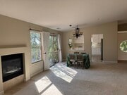 spacious and light living room with fireplace - 380 Greendale Ct