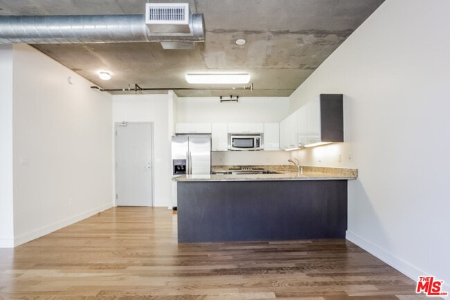 Photo - 645 W 9th St Unit 343