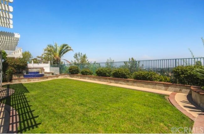 grass has been replaced with flagstone which is beautiful and low maintenance - 2558 Carlton Pl