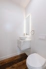 Downstairs powder room - 5257 S San Vicente Blvd Townhome