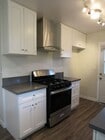 Photo - Charming 1-Bedroom Apartment with Modern U... Unit #12