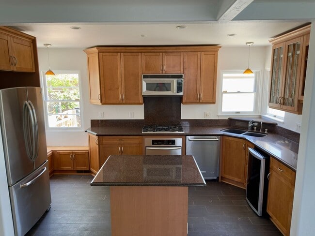 Photo - Renovated 3-Bedroom Home with Private Master Suite, Spacious Backyard & Bonus Room in Central San...