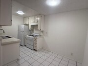 Dining area next to kitchen - 3717 Cardiff Ave Apartments