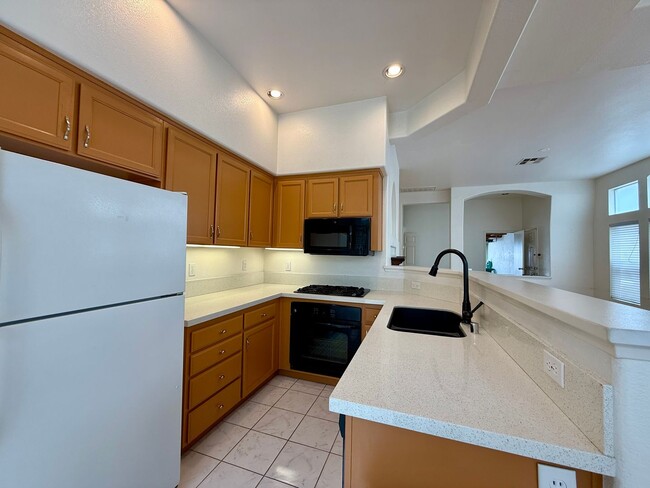 Photo - Spacious 3 Bedroom 2.5 Bath Townhouse with Private Garden Patio & a Community Pool/Spa! Attached ...