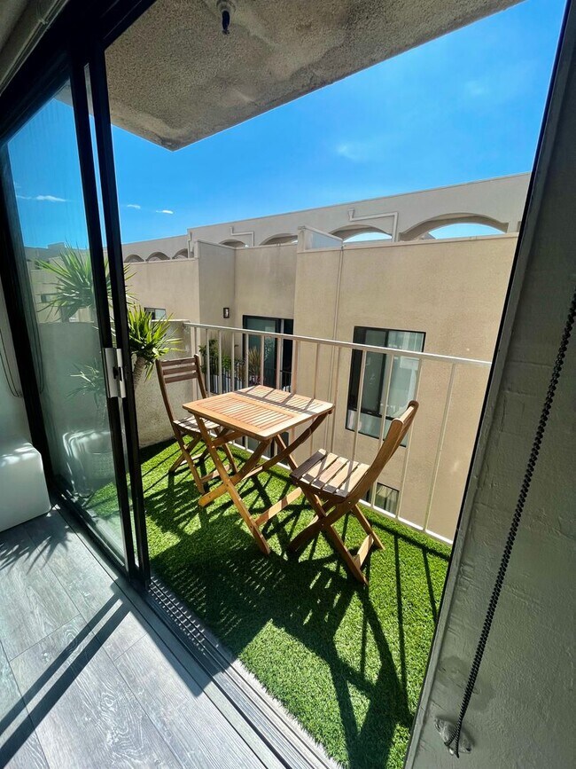 Photo - Live in Luxury Right on the Bay! Assigned Parking! Peek A Boo Bay View!