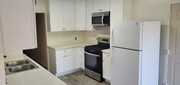 Photo - 721 W 39th St Apartments Unit Front