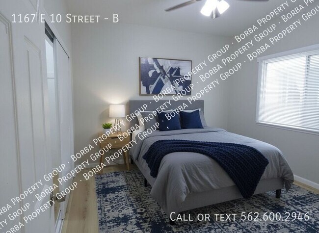 Building Photo - 1167 E 10th St Unit B