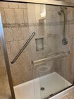Primary Bathroom Shower - 1047 Lincoln Apartments