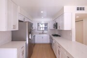 Photo - IN-UNIT LAUNDRY WITH ON-SITE PARKING!! Unit 104