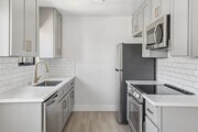 2BR, 1.5BA - 1,000SF - Kitchen - Woodman Apartments