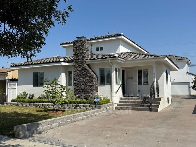 Photo - 1143 W 163rd St House