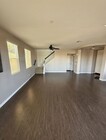 Photo - Charming 3BR Home with Modern Kitchen, Versatile Loft, & Private Backyard