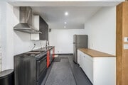 1BR, 1BA - 1577SF - Kitchen - Studios at Walnut