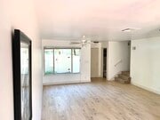 Living room with ceiling fan light fixture - 11138 Aqua Vista St