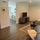 living room goes into kitchen/family/dining room - 1304 Stonewood Ct Townhome