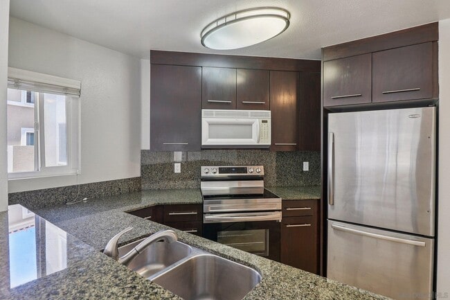 Photo - 7565 Charmant Dr Condo Unit 505