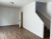 Living room/ downstairs powder bath - 3959 S Van Ness Ave House