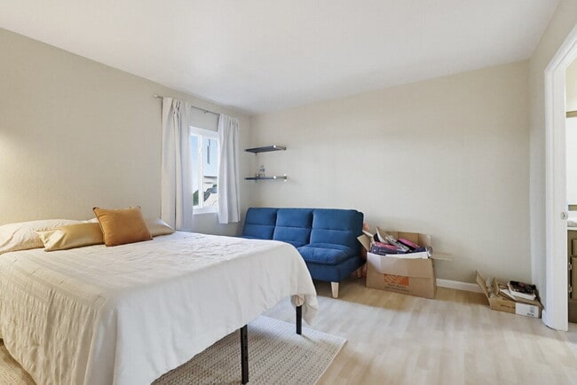 Photo - Welcome to this beautiful 1,042 sq. ft. condo offering modern comfort in a prime location! Unit B