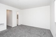 2BR, 2BA - 950SF - First Bedroom - Robin Meadows of Garden Grove Apartments