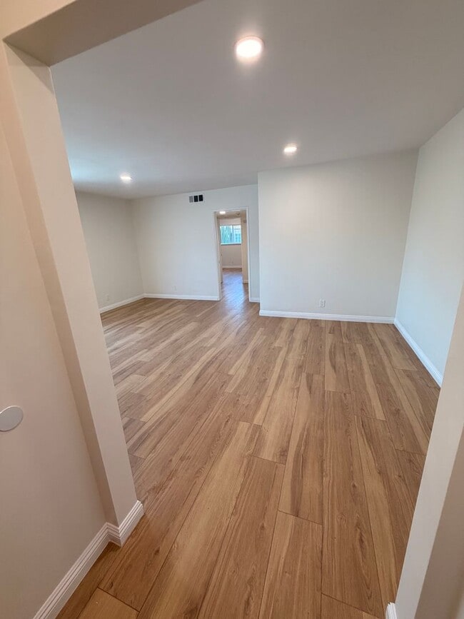 Photo - Completely Remodeled, Spacious 2 Bedroom Apartment For Rent w/ Parking! Unit E