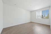 2BR, 2BA - 1090SF - Primary Bedroom - Northpoint Apartments at CSUN