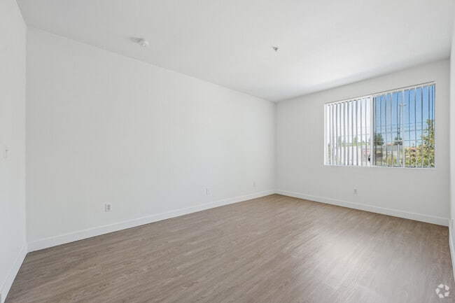2BR, 2BA - 1090SF - Primary Bedroom - Northpoint Apartments at CSUN