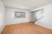 2BR, 1.5BA - 900SF - Living Room - Lakewood Village