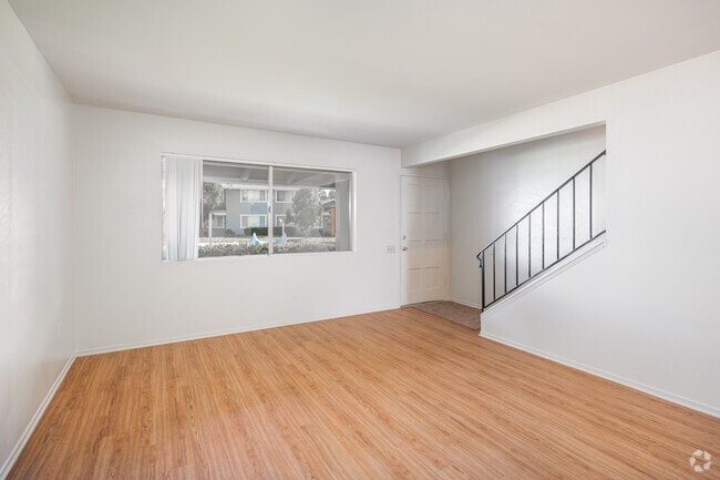 2BR, 1.5BA - 900SF - Living Room - Lakewood Village