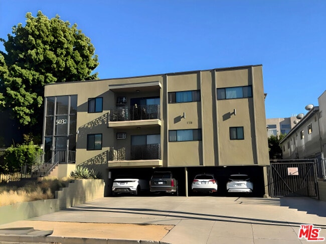 Building Photo - 5032 W Maplewood Ave Unit 103