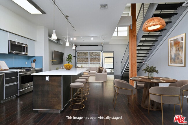 Building Photo - 11500 Tennessee Ave Unit 107