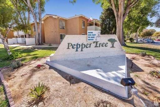 Building Photo - Spacious 2-bedroom 1-bathroom upstairs condo with Balcony/Garage Unit 1901