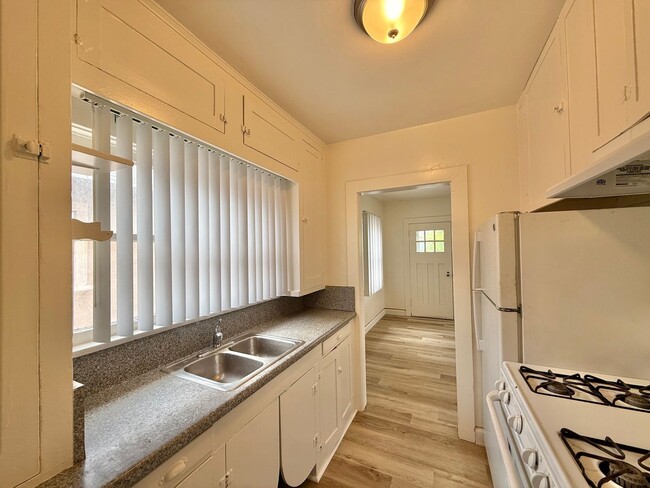 Photo - 2 Bedroom Home nestled in City Heights! With Parking!!