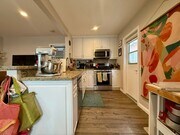 Photo - Modern Bungalow with W/D + A/C! Assigned Parking Included & 1 Garage Storage! Unit 4639 Wilson Avenue