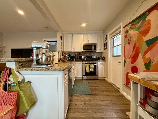 Photo - Modern Bungalow with W/D + A/C! Assigned Parking Included & 1 Garage Storage! Unit 4639 Wilson Avenue