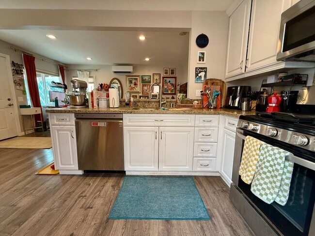 Photo - Modern Bungalow with W/D + A/C! Assigned Parking Included & 1 Garage Storage! Unit 4639 Wilson Avenue