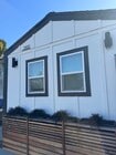 rear of tiny home, which actually faces the street - 3744 Granada Ave House