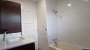 bathroom with tub - 2455 W 233rd St House