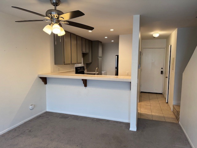 kitchen bar and dining area - powder bathroom to right of front door - 350 Burchett St Unit 350BurchettStreet