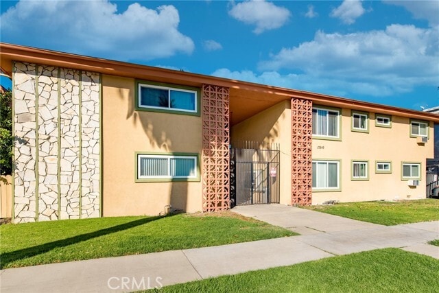 Building Photo - 17845 Sherman Way Unit 7