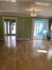 Living room/front entrance - 6412 Fountain Ave Apartments Unit 6412