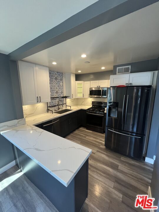 Building Photo - 4418 Colfax Ave Unit 1