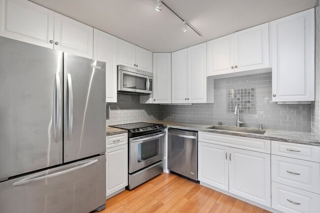 Photo - COMING AVAILABLE 4/5/26: Updated Versailles Condo in Newport Beach Unit 117