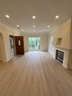 Open living room space with plenty of lighting. - 1062 S Shenandoah St Apartments Unit 1062