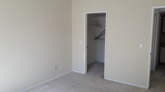with large walk in closet - 3500 S Greenville St Condo Unit A12